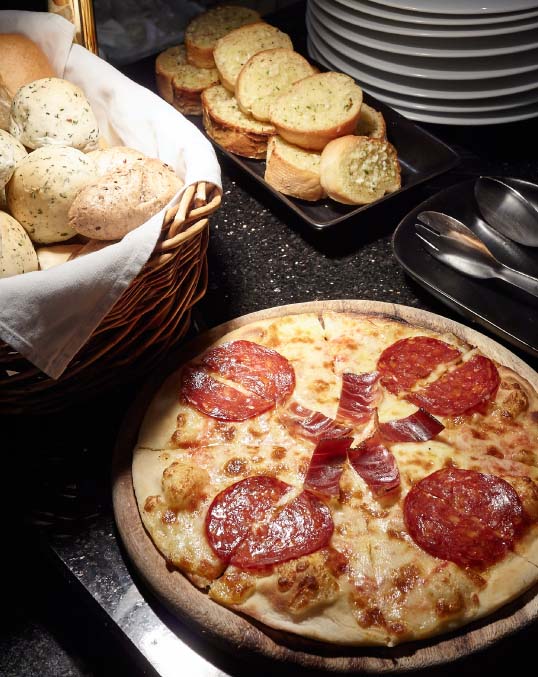 Enjoy a lunch with fresh breads and Authentic pizza